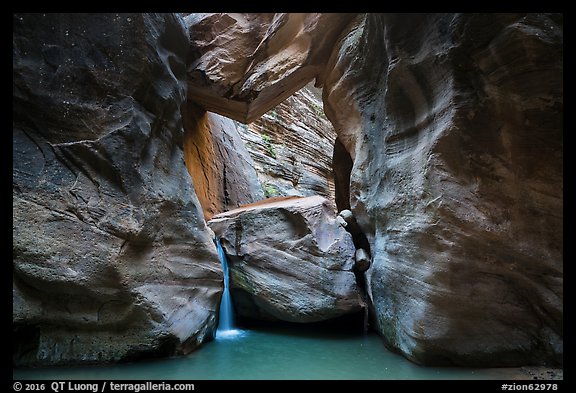 Large boulder creating waterfall with a second boulder suspended above, Orderville Canyon. Zion National Park (color)