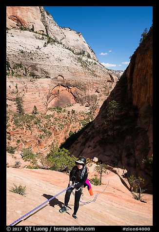 Canyonneer rappels on slab, Behunin Canyon. Zion National Park, Utah (color)