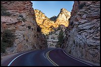 Road cut in cliffs, Zion Plateau. Zion National Park, Utah, USA.