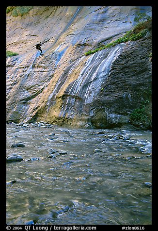 Canyoneer rappelling alongside Mystery Falls, the Narrows. Zion National Park, Utah (color)