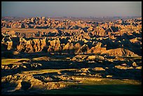 View over eroded ridges from Pinacles overlook, sunrise. Badlands National Park, South Dakota, USA. (color)