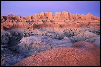 Cracked mud and erosion formations, Cedar Pass, dawn. Badlands National Park, South Dakota, USA.