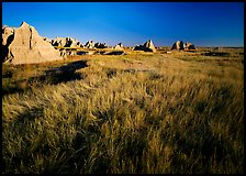 Tall grass prairie and badlands near Cedar Pass. Badlands National Park, South Dakota, USA.