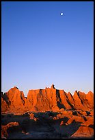 Moon and erosion formations, Cedar Pass, dawn. Badlands National Park, South Dakota, USA. (color)