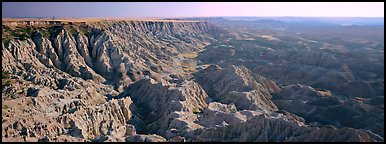 Badlands carved into prairie by erosion. Badlands National Park (Panoramic color)