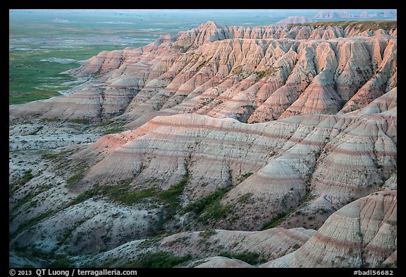 Badlands with colorful stripes at sunrise. Badlands National Park (color)