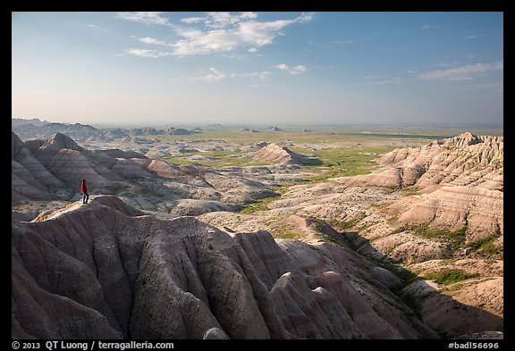 Park visitor looking, Panorama Point. Badlands National Park, South Dakota, USA.