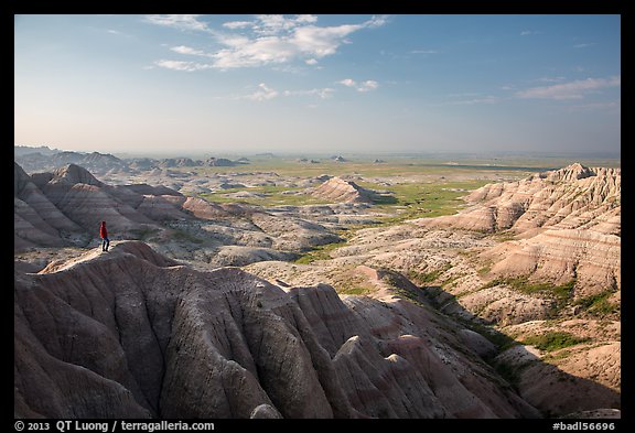 Park visitor looking, Panorama Point. Badlands National Park, South Dakota, USA.