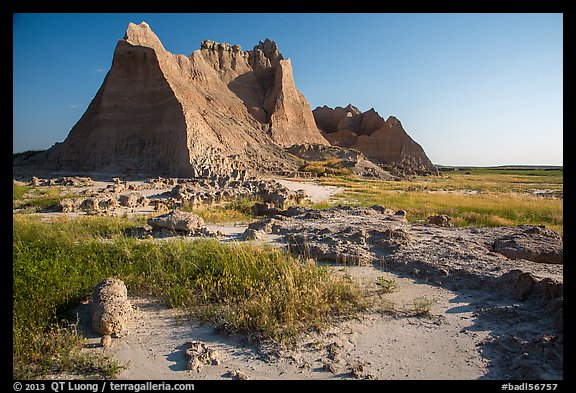 Brule formation butte raising from prairie. Badlands National Park (color)