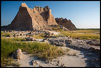 Brule formation butte raising from prairie. Badlands National Park ( color)