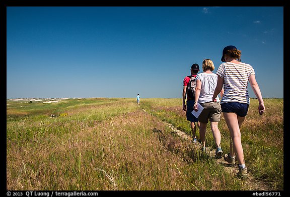 Hikers on Medicine Root Trail. Badlands National Park, South Dakota, USA.