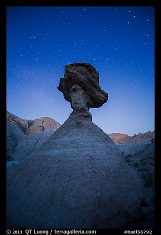 Pedestal rock at badlands at night. Badlands National Park, South Dakota, USA.