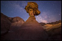 Pillar with caprock, badlands, and Milky Way. Badlands National Park, South Dakota, USA. (color)