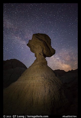 Balanced rock at night with starry sky and Milky Way. Badlands National Park, South Dakota, USA.