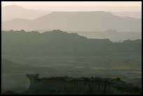 Backlit ridges of the Stronghold table in the southern unit, sunrise. Badlands National Park ( color)