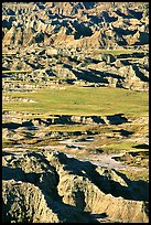 Badlands mixed with prairie from Pinacles overlook, morning. Badlands National Park ( color)