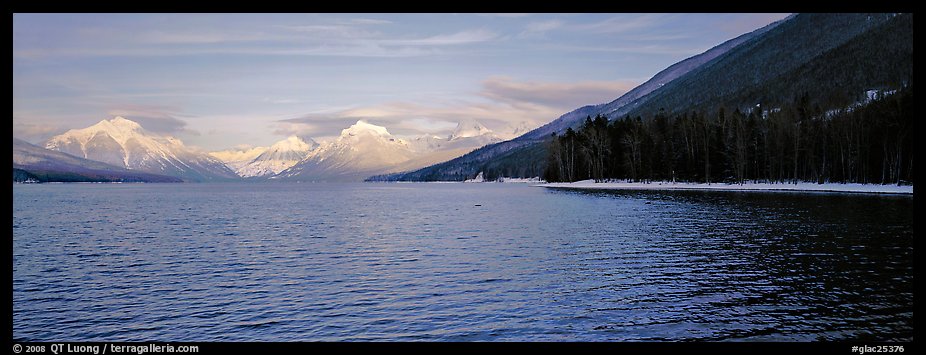 Snowy mountains across Mc Donald Lake. Glacier National Park, Montana, USA.