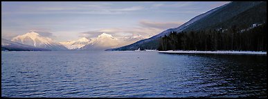 Snowy mountains across Mc Donald Lake. Glacier National Park, Montana, USA.