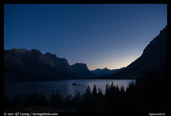 St Mary Lake at night with stars. Glacier National Park, Montana, USA.