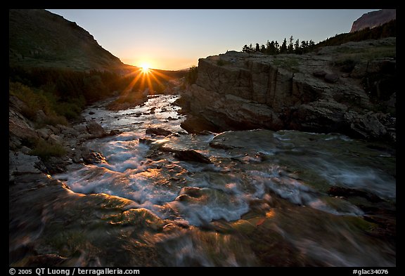 Outlet stream of Swiftcurrent Lake, sunrise. Glacier National Park, Montana, USA.