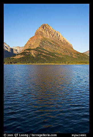 Grinnell Point across Swiftcurrent Lake, sunrise. Glacier National Park (color)