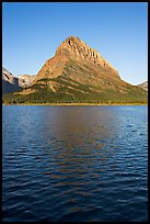 Grinnell Point across Swiftcurrent Lake, sunrise. Glacier National Park ( color)