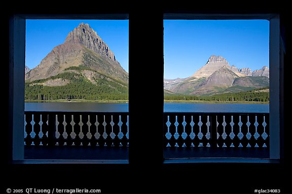 Grinnell Point and Swiftcurrent Lake framed by windows of Many Glacier Lodge. Glacier National Park (color)