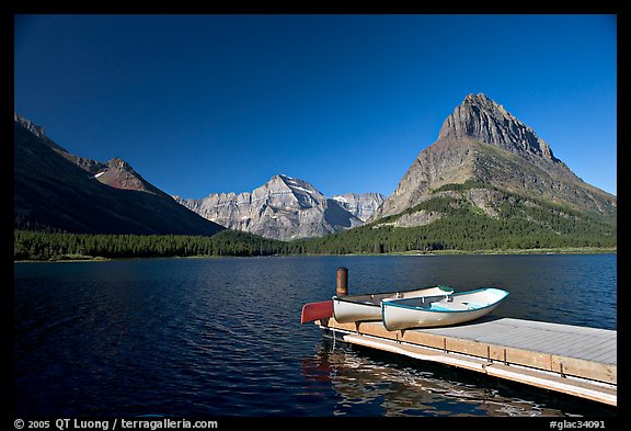 Deck and small boats on Swiftcurrent Lake. Glacier National Park, Montana, USA.