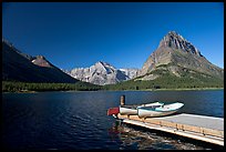 Deck and small boats on Swiftcurrent Lake. Glacier National Park, Montana, USA.