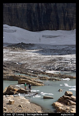 Crossing the outlet stream of the Grinnell glacial lake. Glacier National Park, Montana, USA.