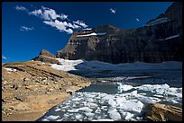 Upper Grinnell Lake with icebergs, late afternoon. Glacier National Park, Montana, USA.