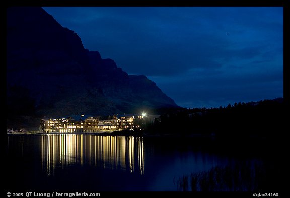 Many Glacier lodge lights reflected in Swiftcurrent Lake at night. Glacier National Park (color)