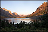 St Mary Lake, Going-to-the-sun Mountain, and Lewis Range, sunrise. Glacier National Park, Montana, USA.