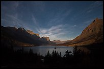 Saint Mary Lake at night with light from rising moon. Glacier National Park, Montana, USA.