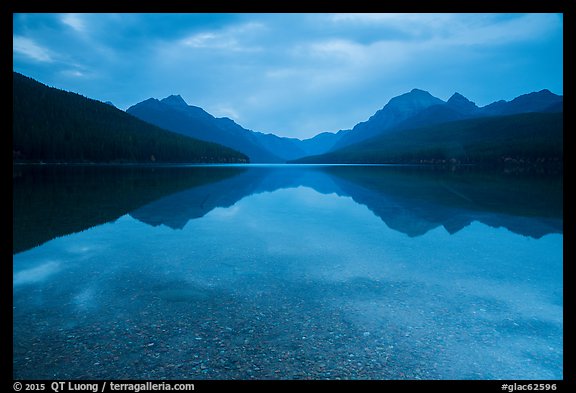 Reflections and pebbles at dawn, Bowman Lake. Glacier National Park (color)
