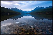 Submerged rocks and mountain reflected, Bowman Lake. Glacier National Park ( color)