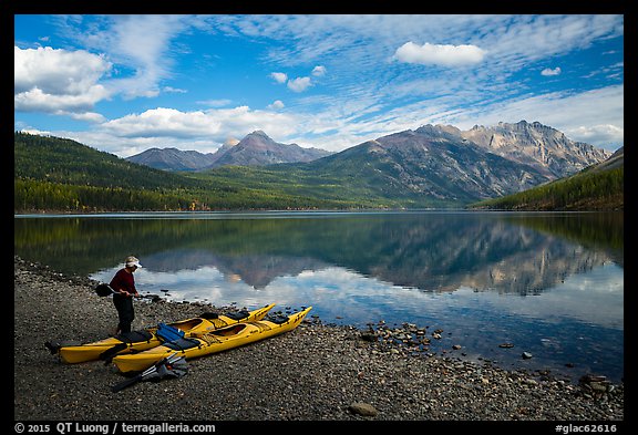 Kayaker readying gear, Kintla Lake. Glacier National Park (color)