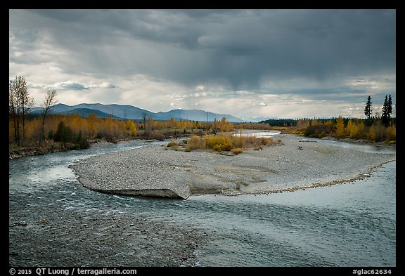 Storm clouds over wide stretch of North Fork of Flathead River. Glacier National Park (color)