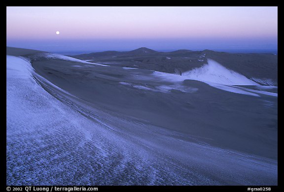 Fresh snow on the dunes at dawn. Great Sand Dunes National Park, Colorado, USA.