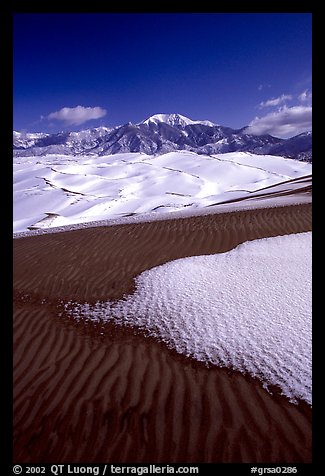 Sand dunes with snow patches. Great Sand Dunes National Park and Preserve, Colorado, USA.