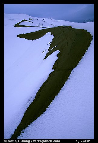 Curve on snowy dunes. Great Sand Dunes National Park and Preserve, Colorado, USA.