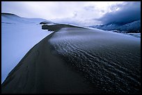 Snow on the dunes. Great Sand Dunes National Park, Colorado, USA.