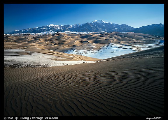 Rippled dunes and Sangre de Christo mountains in winter. Great Sand Dunes National Park and Preserve, Colorado, USA.