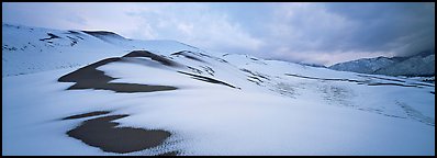 Dune field covered by snow. Great Sand Dunes National Park (Panoramic color)