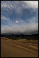 Dunes, moonlit clouds, and stars. Great Sand Dunes National Park, Colorado, USA. (color)