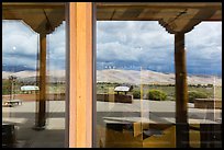 Dune field, visitor center window reflexion. Great Sand Dunes National Park, Colorado, USA. (color)