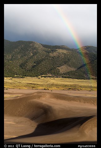 Rainbow over dune field. Great Sand Dunes National Park, Colorado, USA.