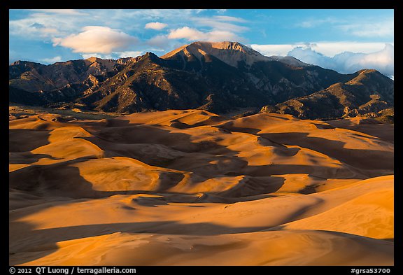 Last light over dune field and Mount Herard. Great Sand Dunes National Park, Colorado, USA.