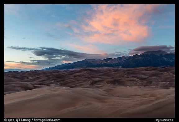 Dune field and Sangre de Cristo mountains with cloud lighted by sunset. Great Sand Dunes National Park and Preserve (color)