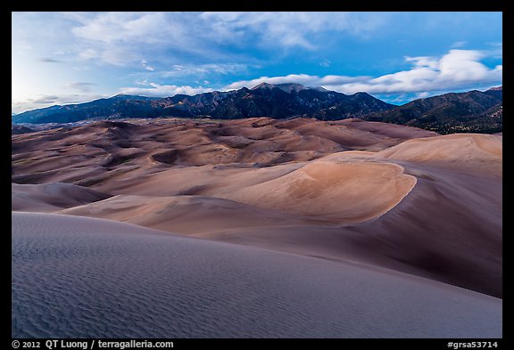 Dunes and Sangre de Cristo mountains at dusk. Great Sand Dunes National Park, Colorado, USA.